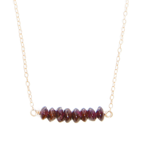 'kara' necklace with garnet